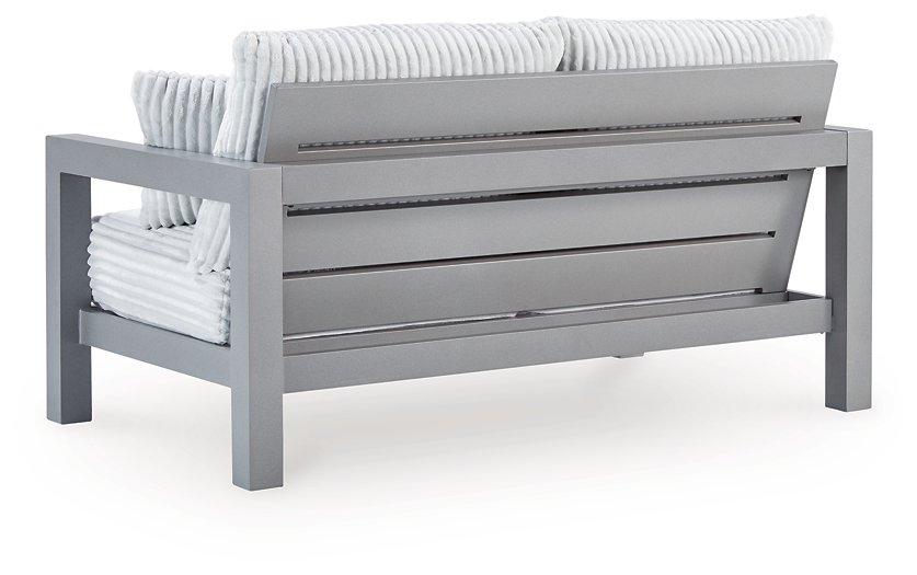 Hurley Park Outdoor Loveseat with Cushion - Carl's Furniture (Garden City, KS)