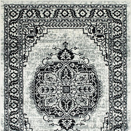 Serang Gray/Black 5' X 7' Area Rug - Carl's Furniture (Garden City, KS)