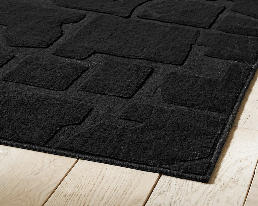 Gibbswell Washable Area Rug - Carl's Furniture (Garden City, KS)