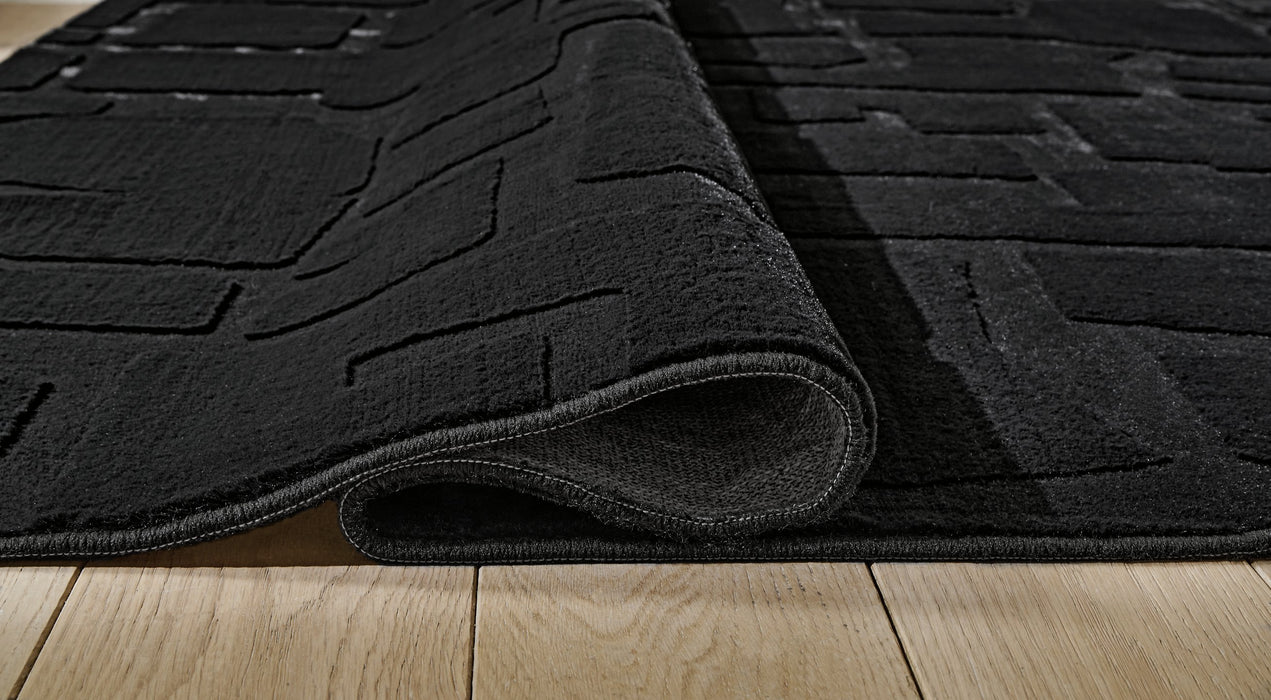 Gibbswell Washable Area Rug - Carl's Furniture (Garden City, KS)