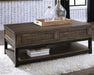 Johurst Coffee Table with Lift Top - Carl's Furniture (Garden City, KS)