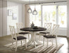 HALEIGH Round Dining Table - Carl's Furniture (Garden City, KS)