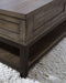 Johurst Coffee Table with Lift Top - Carl's Furniture (Garden City, KS)